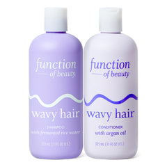 Function of Beauty set frontal mostrando botellas y beneficio antifrizz