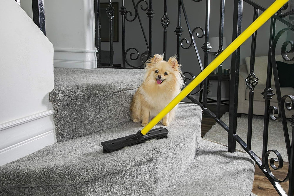 FURemover in use on carpet lifting embedded pet fur for faster cleanup