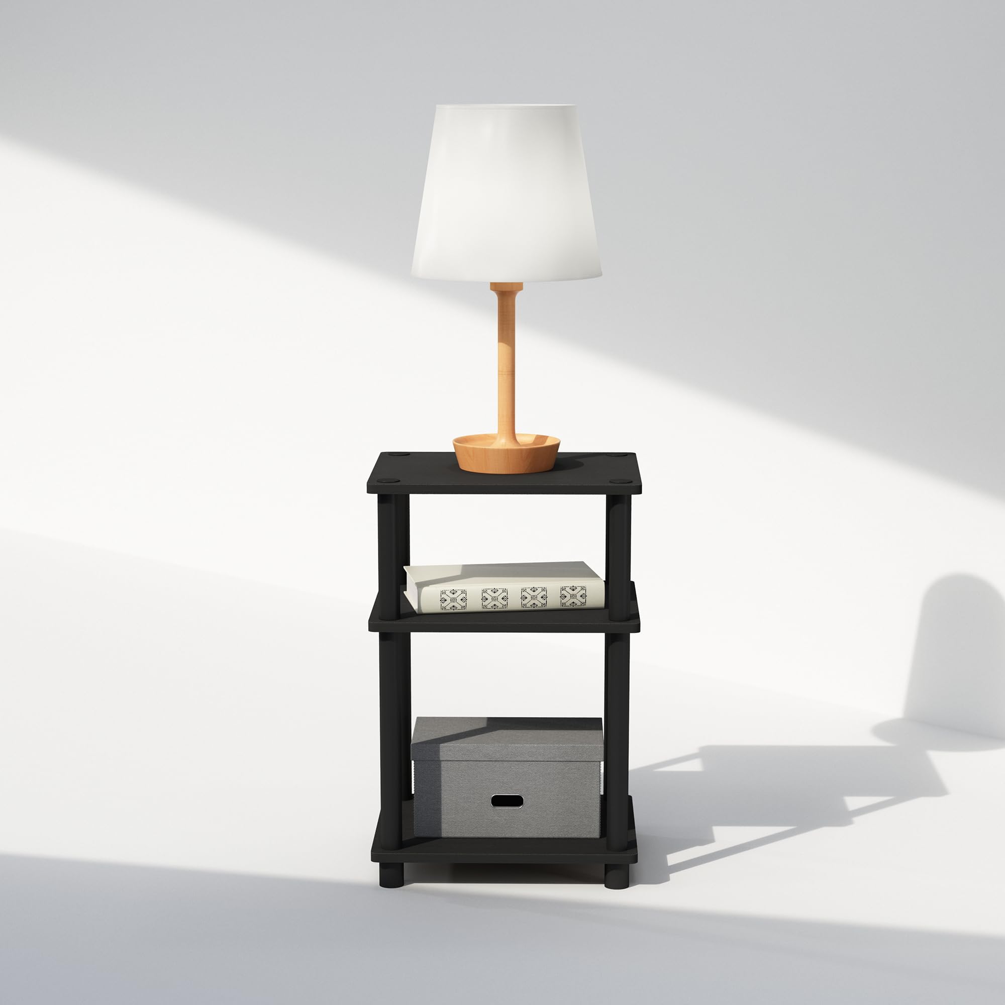 Furinno mesita junto a libros para comparar tamaño y capacidad práctica