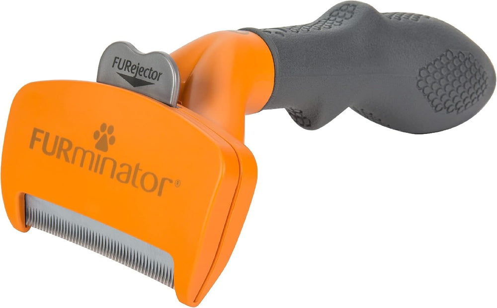 FURminator herramienta frontal mostrando diseño ergonómico y control del pelo