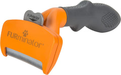 FURminator herramienta frontal mostrando diseño ergonómico y control del pelo