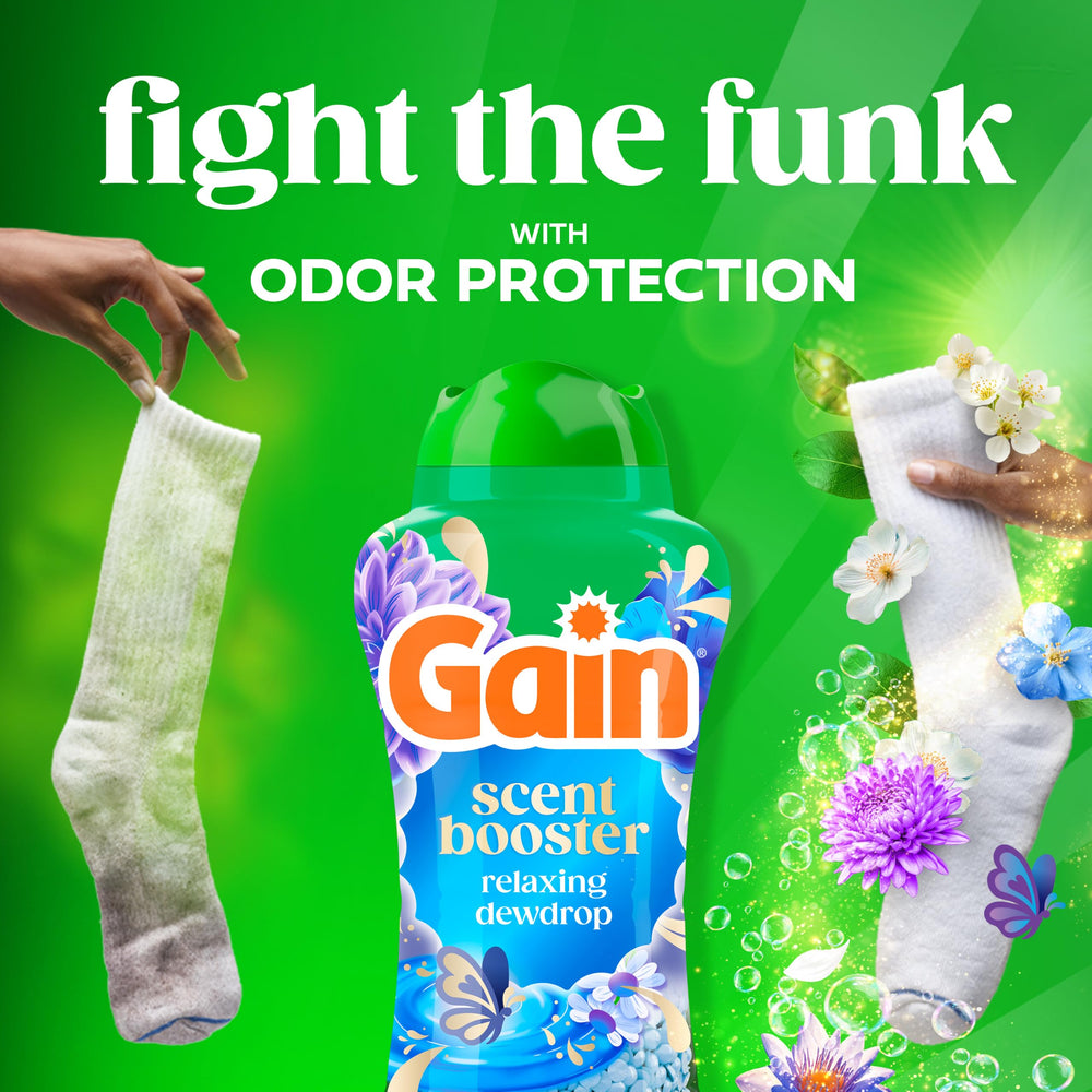 Gain botella junto a regla para comparar tamaño y capacidad de 24 oz