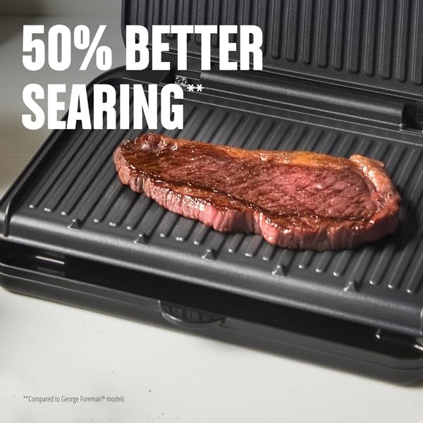 George Foreman removable drip tray being washed for easier cleanup benefit