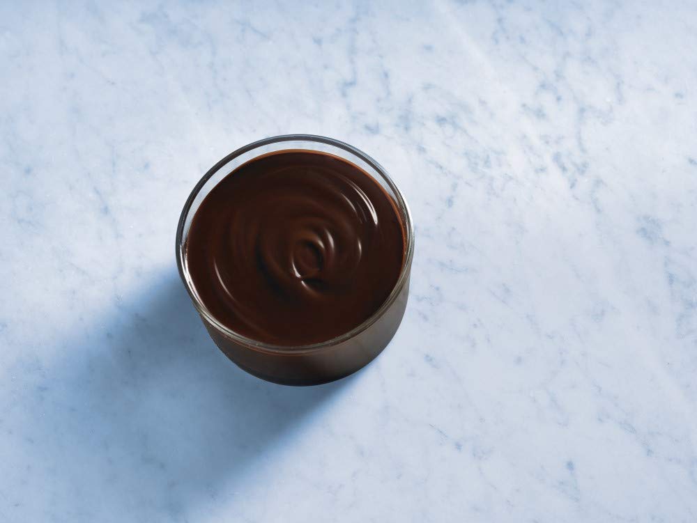 Ghirardelli textura suave de la salsa, evidencia sedosidad para mezclar fácilmente