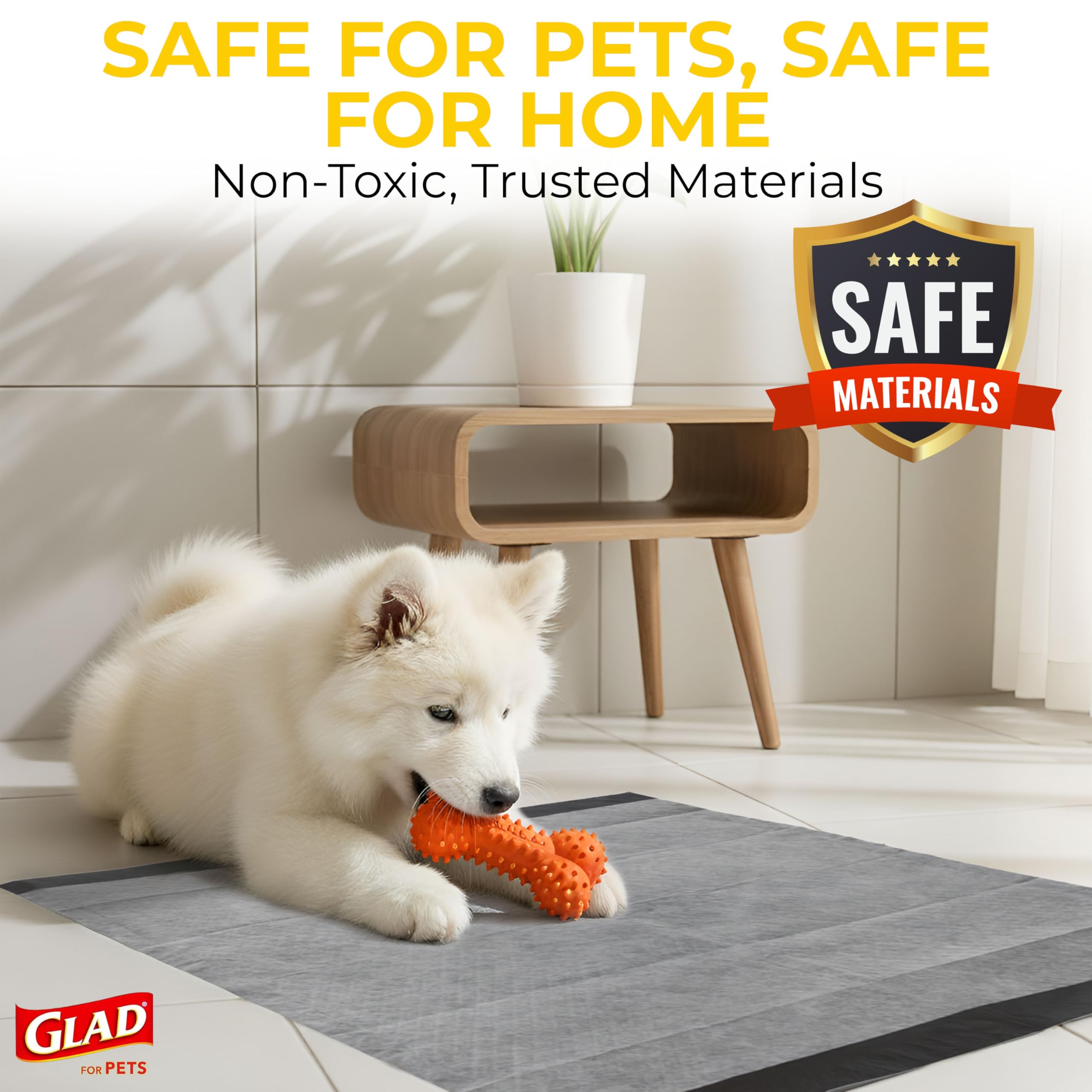Glad for Pets tapete junto a pata de perro para visualización de escala