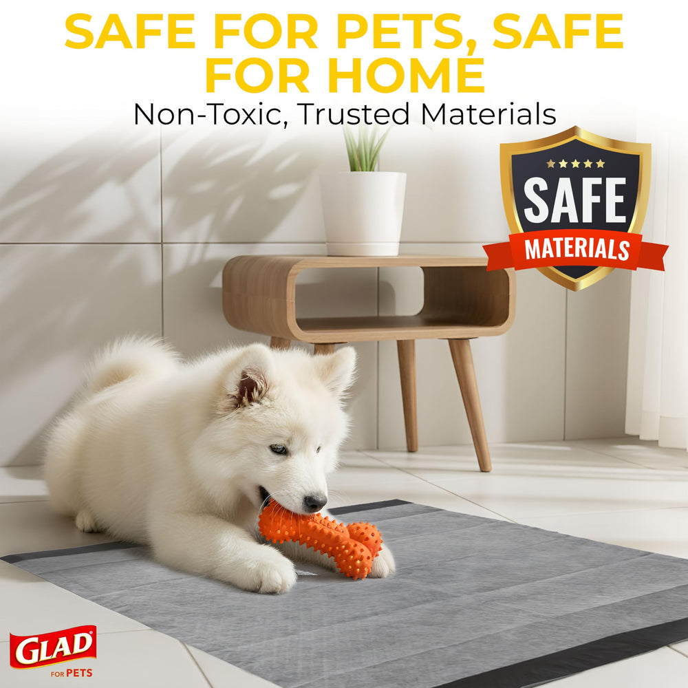 Glad for Pets tapete junto a pata de perro para visualización de escala