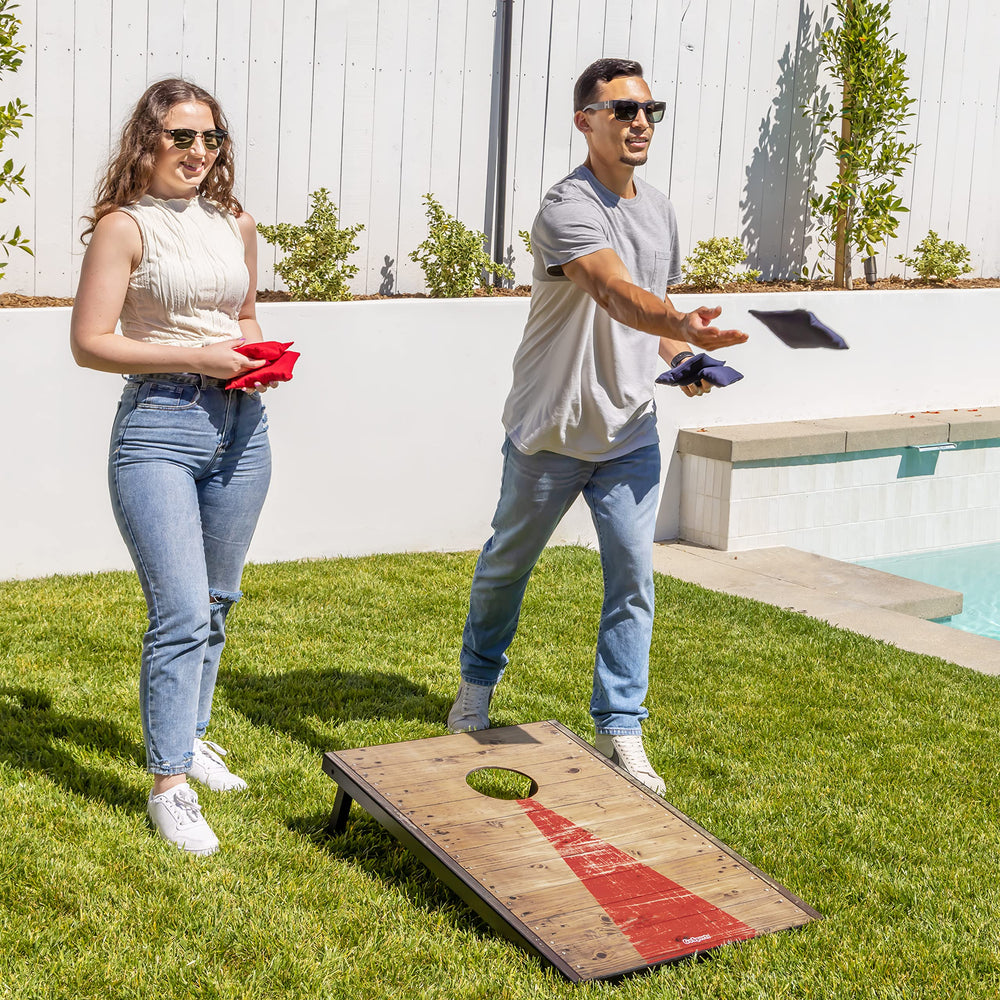 GoSports tablero en uso en jardín, fomenta diversión social al aire libre