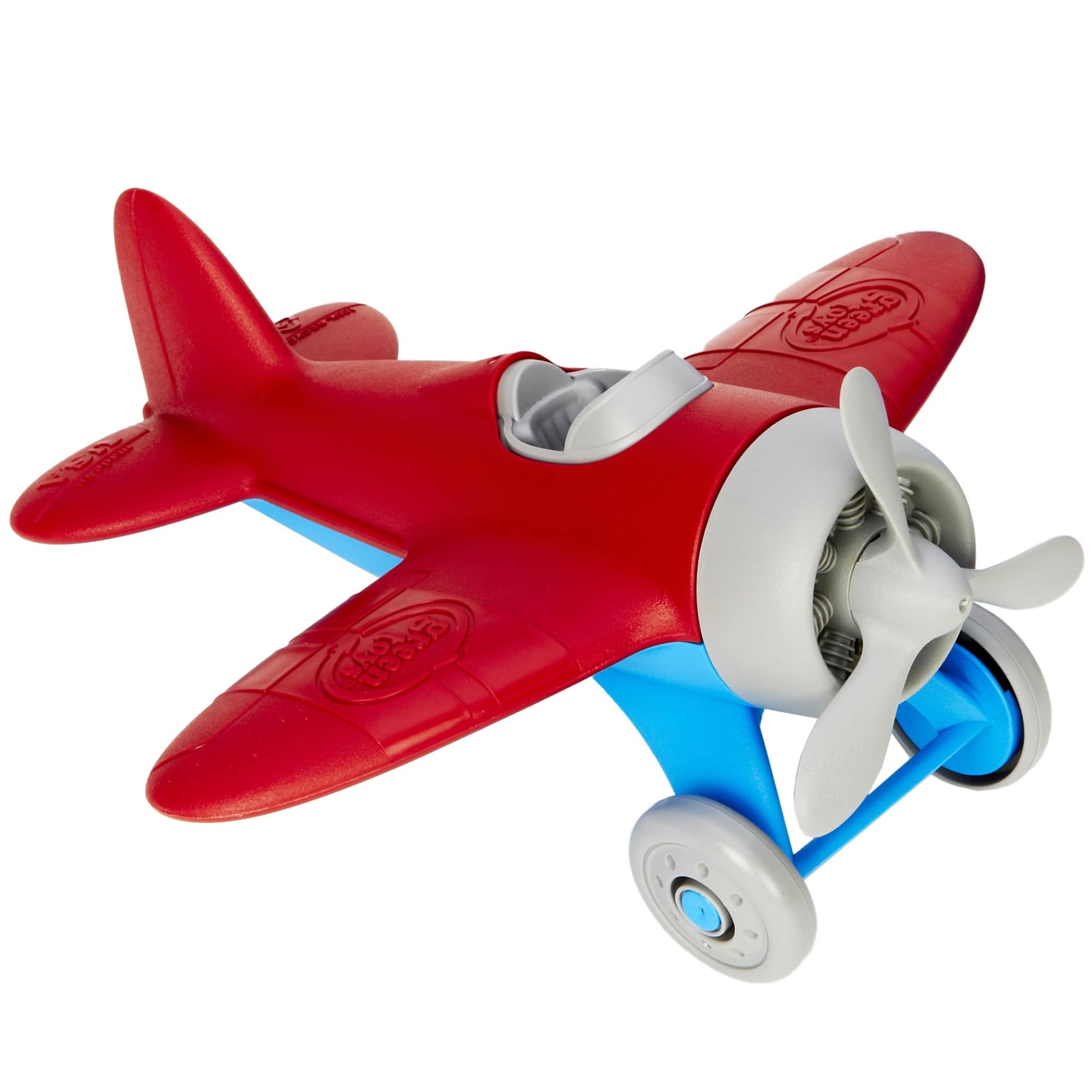 Green Toys avión en césped escena de juego exterior estimulante
