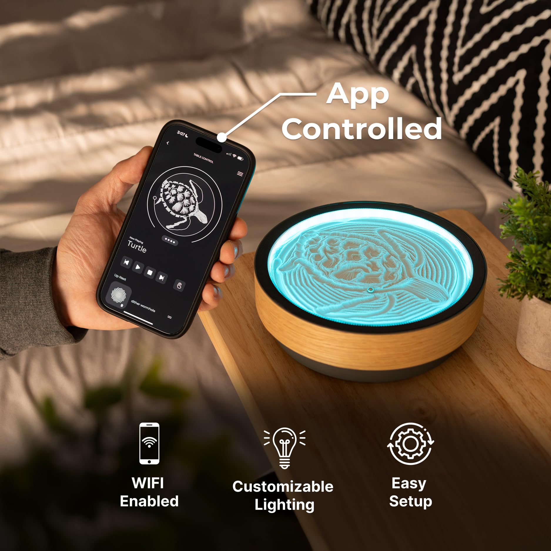 Oasis Mini con iluminación LED RGB encendida creando ambiente relajante