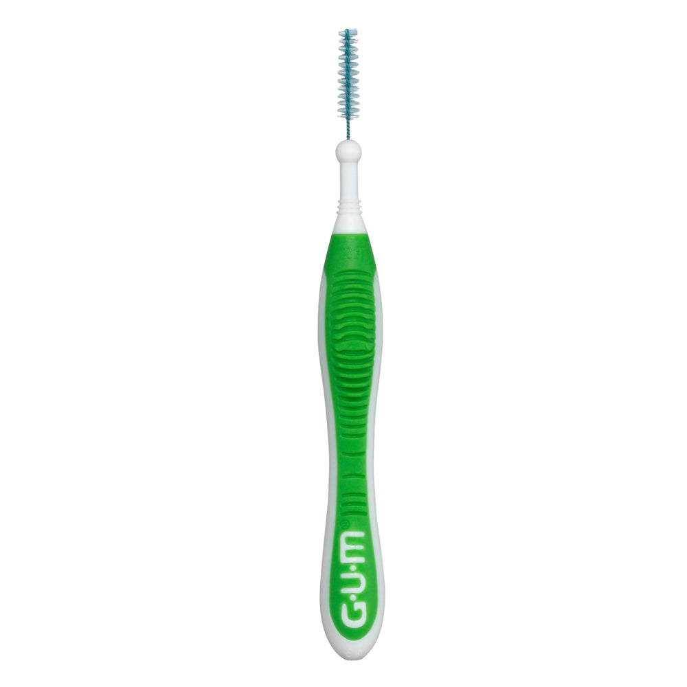 Person using GUM Proxabrush for fast between-teeth cleaning on the go