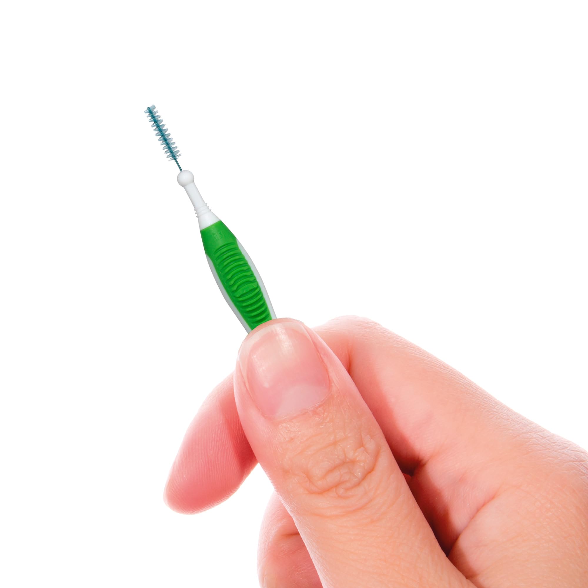 GUM Proxabrush next to a hand to show compact size and portability