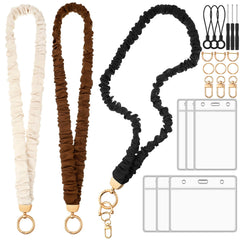 HairChrysm vista frontal del empaque mostrando los tres lanyards y fundas