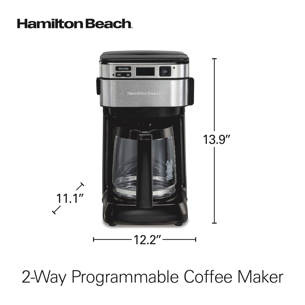Hamilton Beach comparación de tamaño junto a una taza para escala