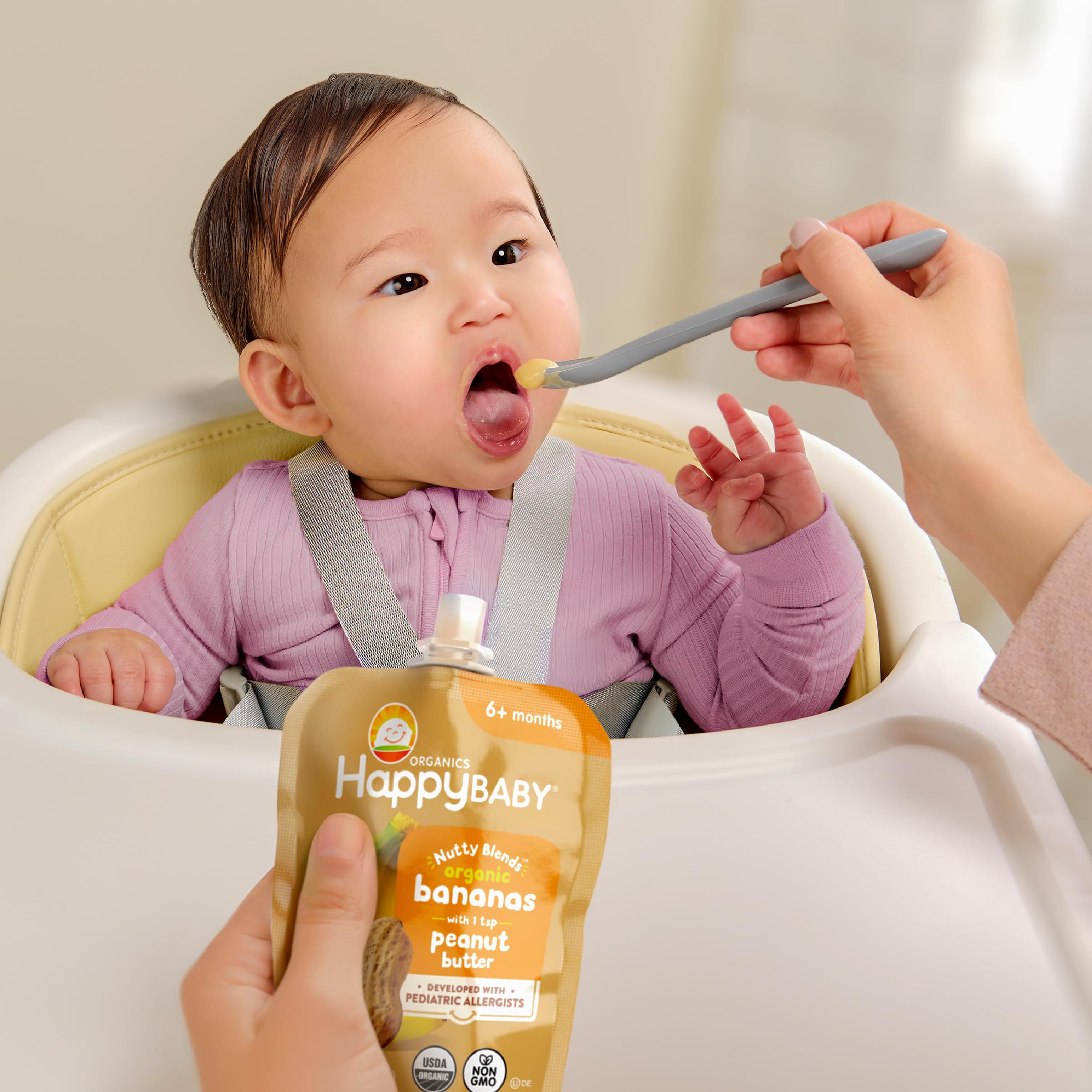 Happy Baby surtido de ocho variedades mostrando mezclas fruta y nuez