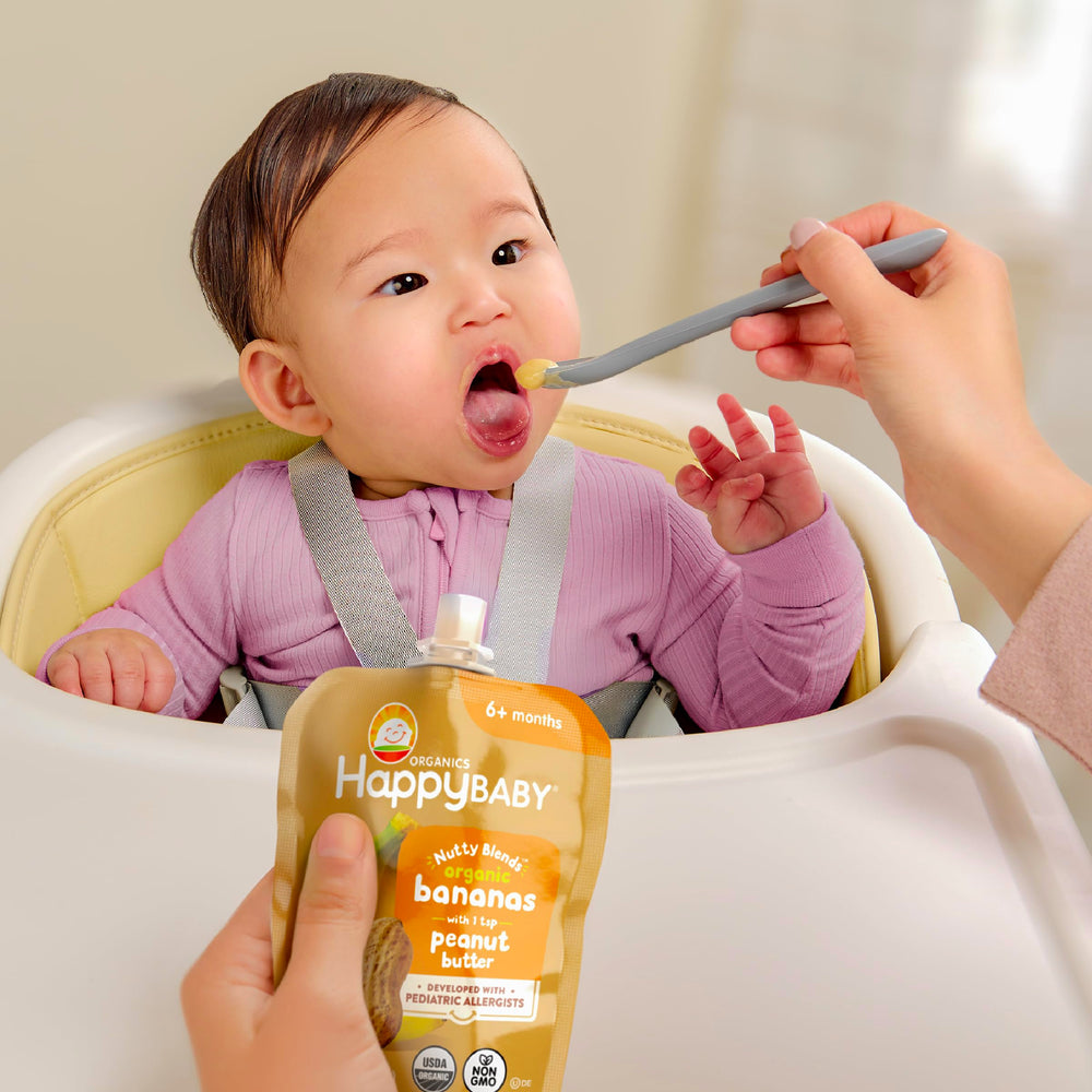 Happy Baby surtido de ocho variedades mostrando mezclas fruta y nuez