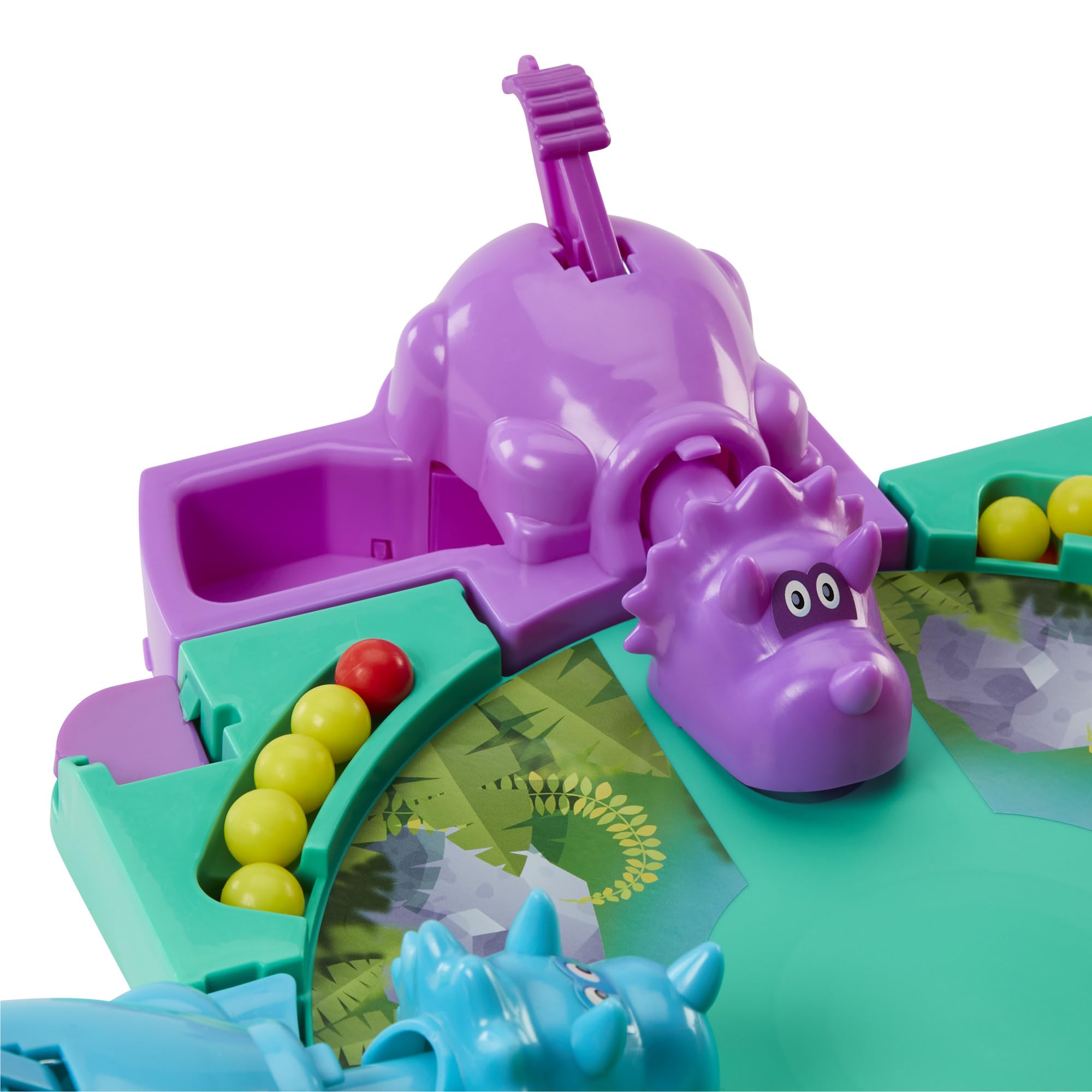 Hasbro dino foto con regla para comparar tamaño de las canicas y piezas robustas