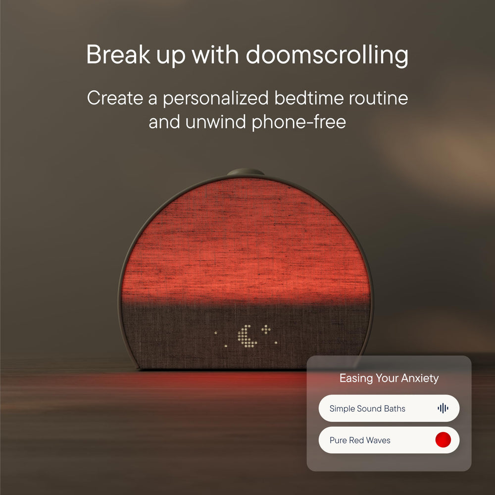 Hatch Restore 3 emitiendo luz de amanecer para un despertar gradual y suave