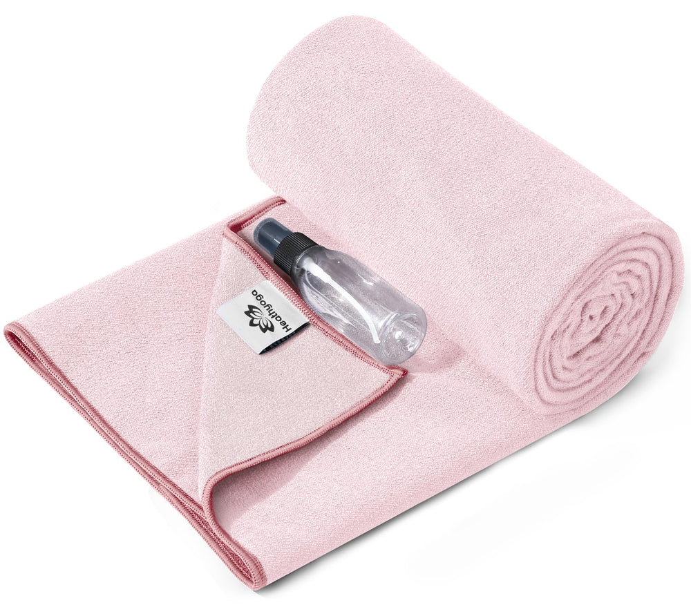 Heathyoga front view showing pink towel folded, clear brand and size benefits