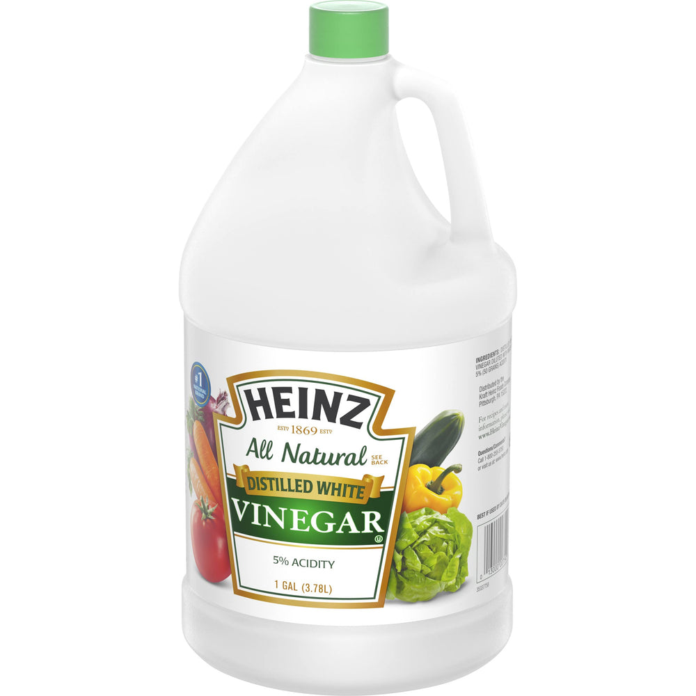 HEINZ vinagre vertido sobre ensalada, realza sabores y aliños