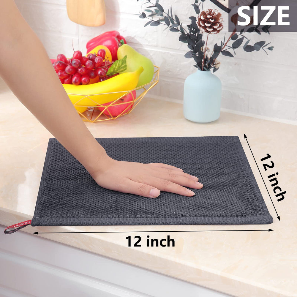 Homaxy paño junto a una regla para comparar tamaño 30x30 cm, claro