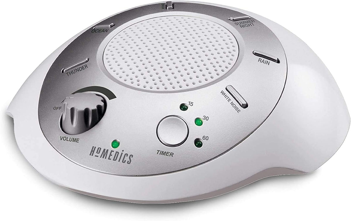 Homedics SoundSleep vista frontal plateada mostrando controles y diseño compacto para ahorro de espacio
