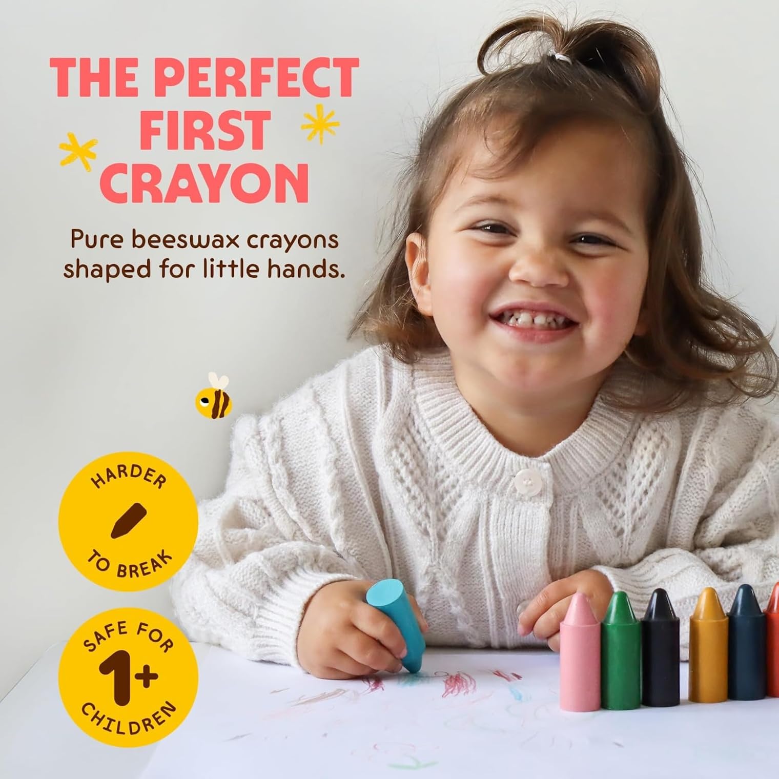 Honeysticks manos de bebé sujetando crayón, diseño ergonómico que facilita el agarre