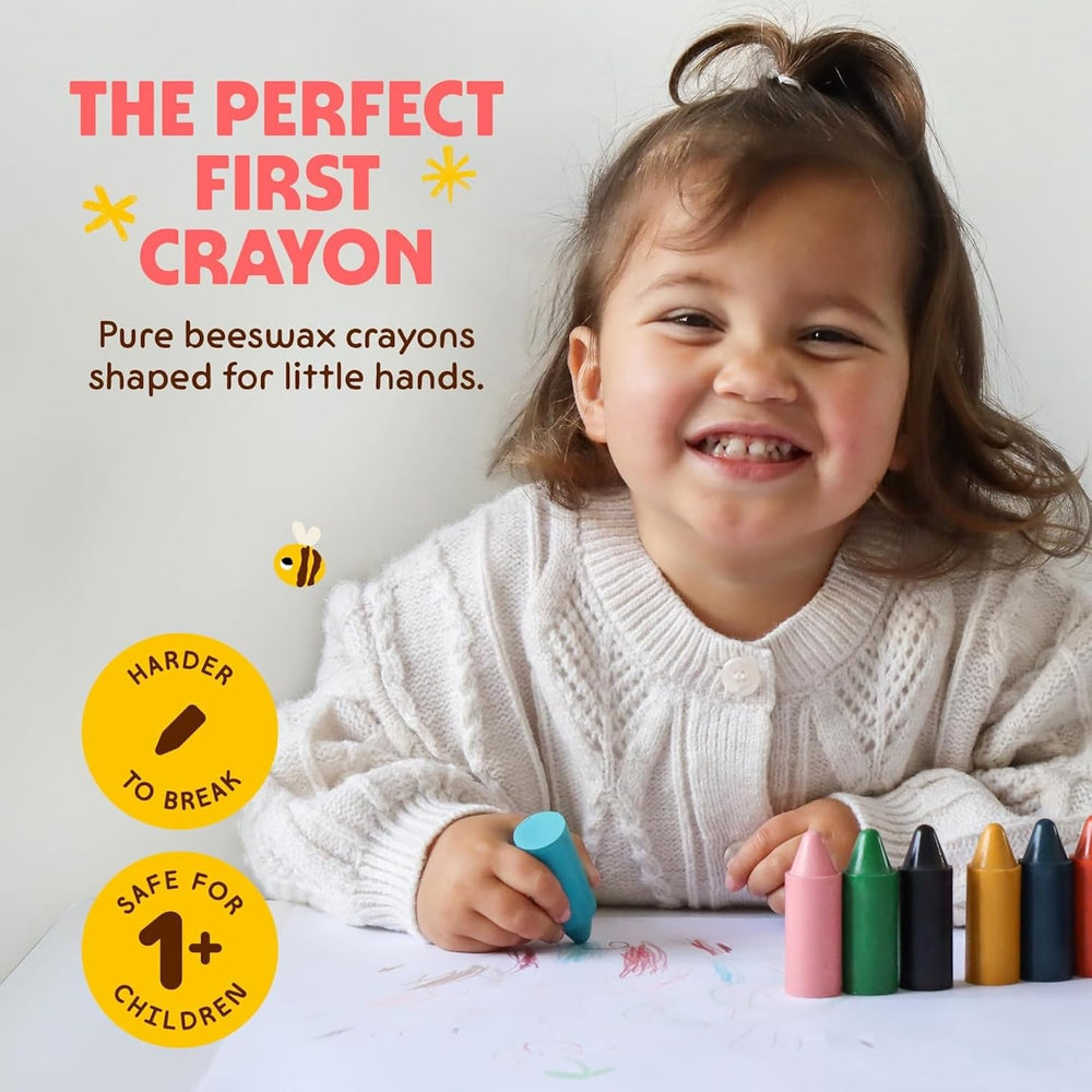 Honeysticks manos de bebé sujetando crayón, diseño ergonómico que facilita el agarre