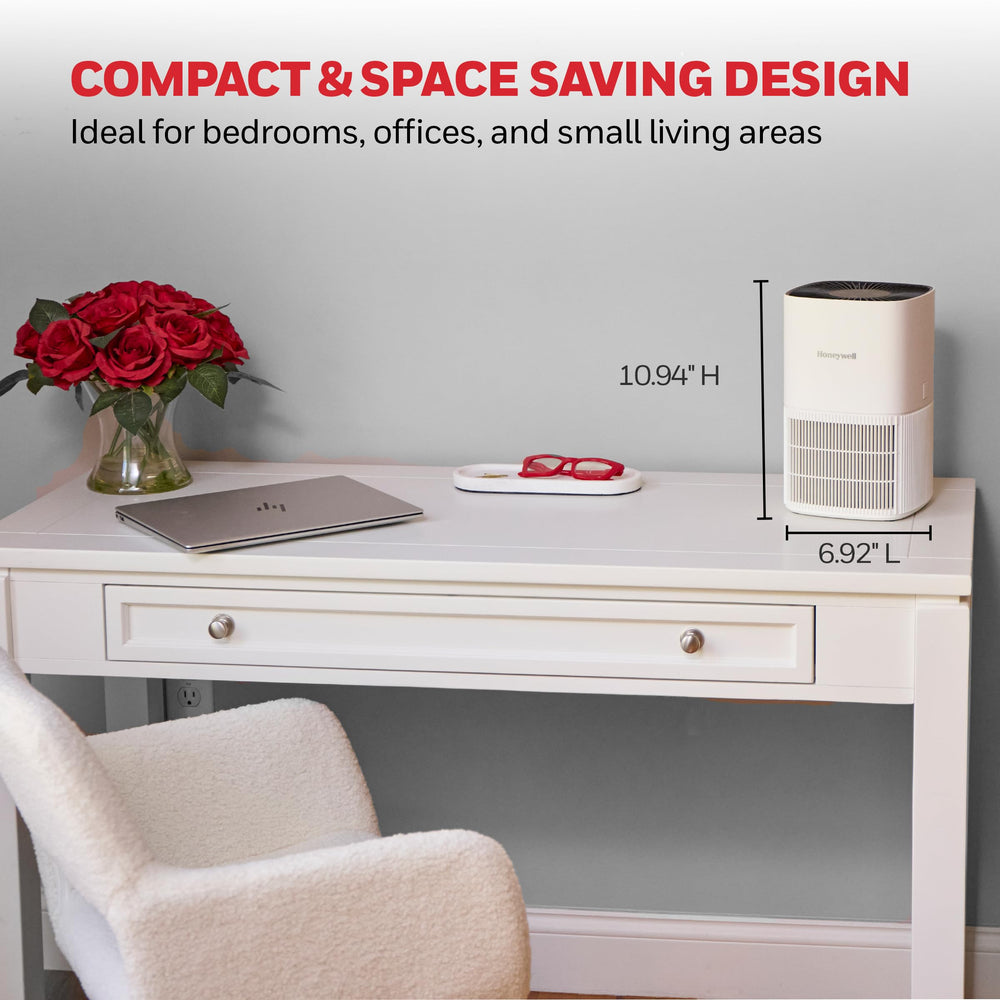 Honeywell comparación de tamaño junto a un portátil para visualizar escala compacta