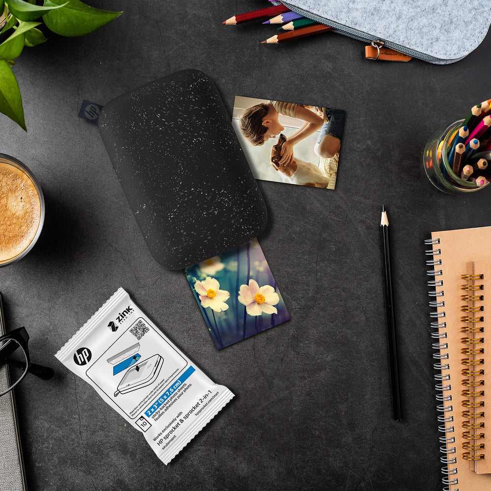 HP Sprocket photos in a scrapbook demonstrating creative display benefit