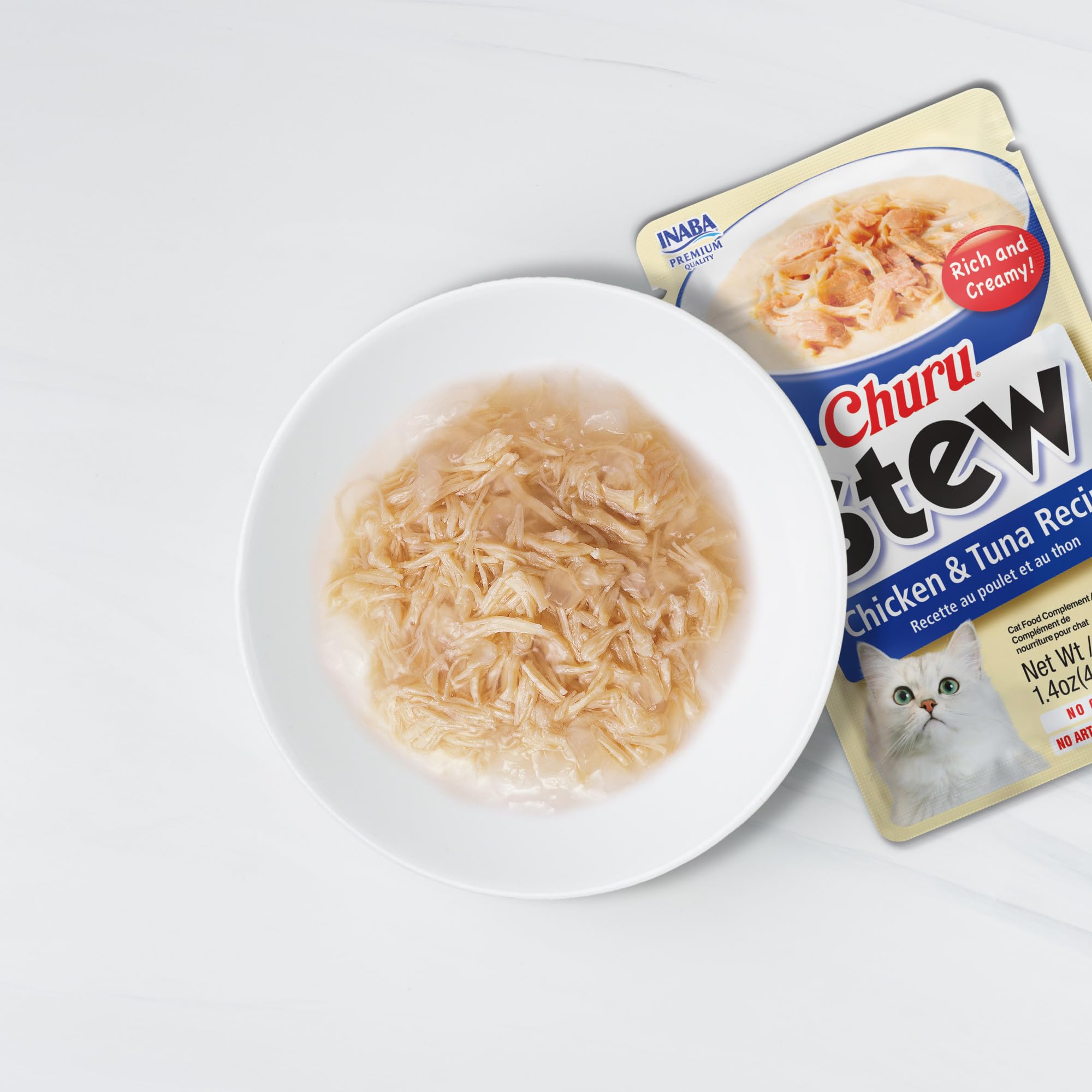 INABA gelée espesa con tiras de pollo destacando textura apetecible