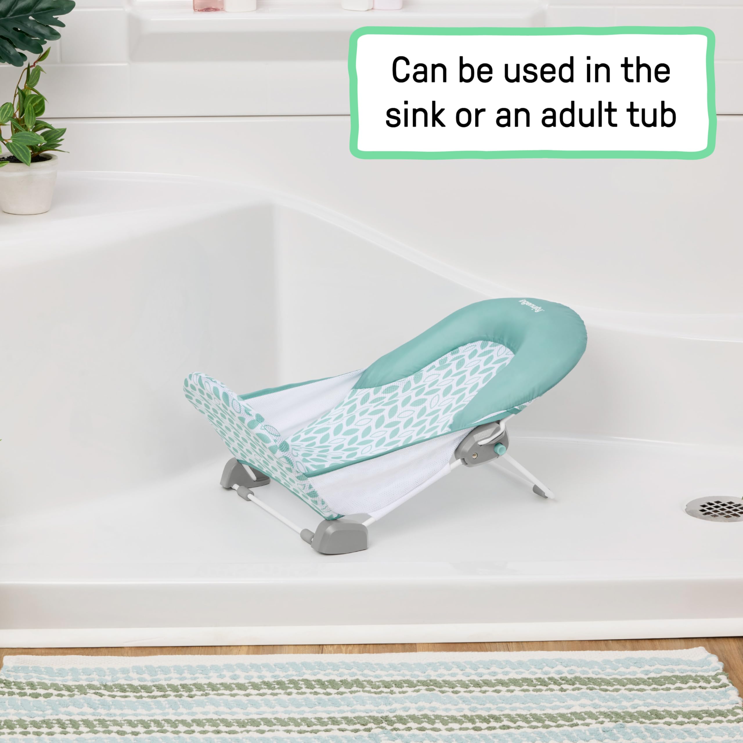 Ingenuity bather colocado en bañera adulta para baño cómodo del bebé