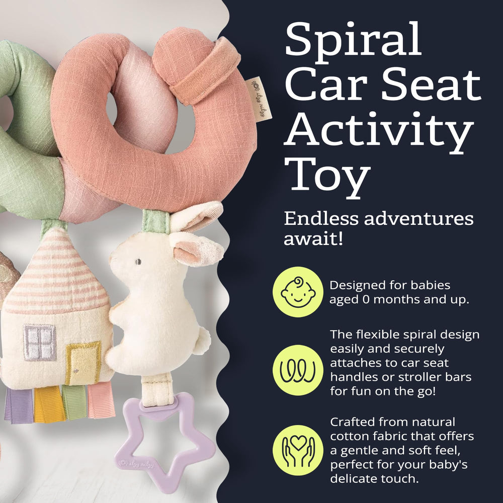 Itzy Ritzy spiral attached to stroller providing on-the-go entertainment