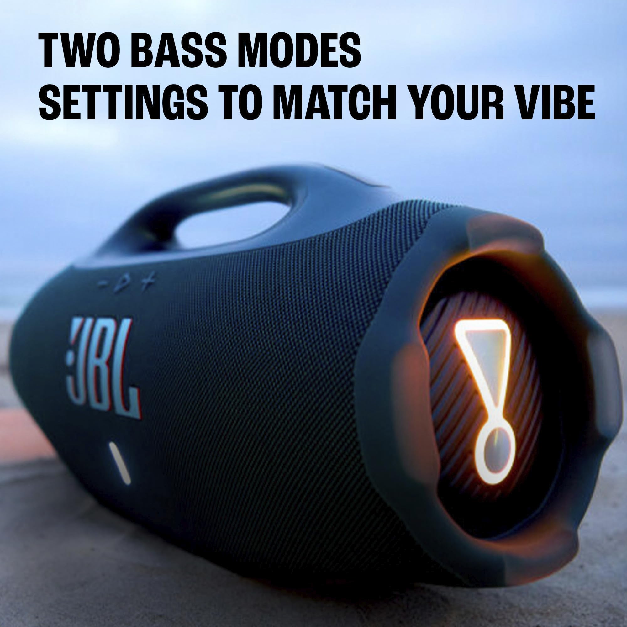 JBL Boombox 4 en la playa resistente al agua y a salpicaduras