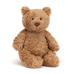 Jellycat Bartholomew vista frontal con pose sentada, invitando al abrazo