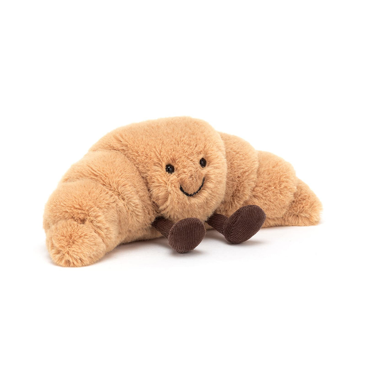 Jellycat croissant frontal mostrando diseño sonriente y textura suave