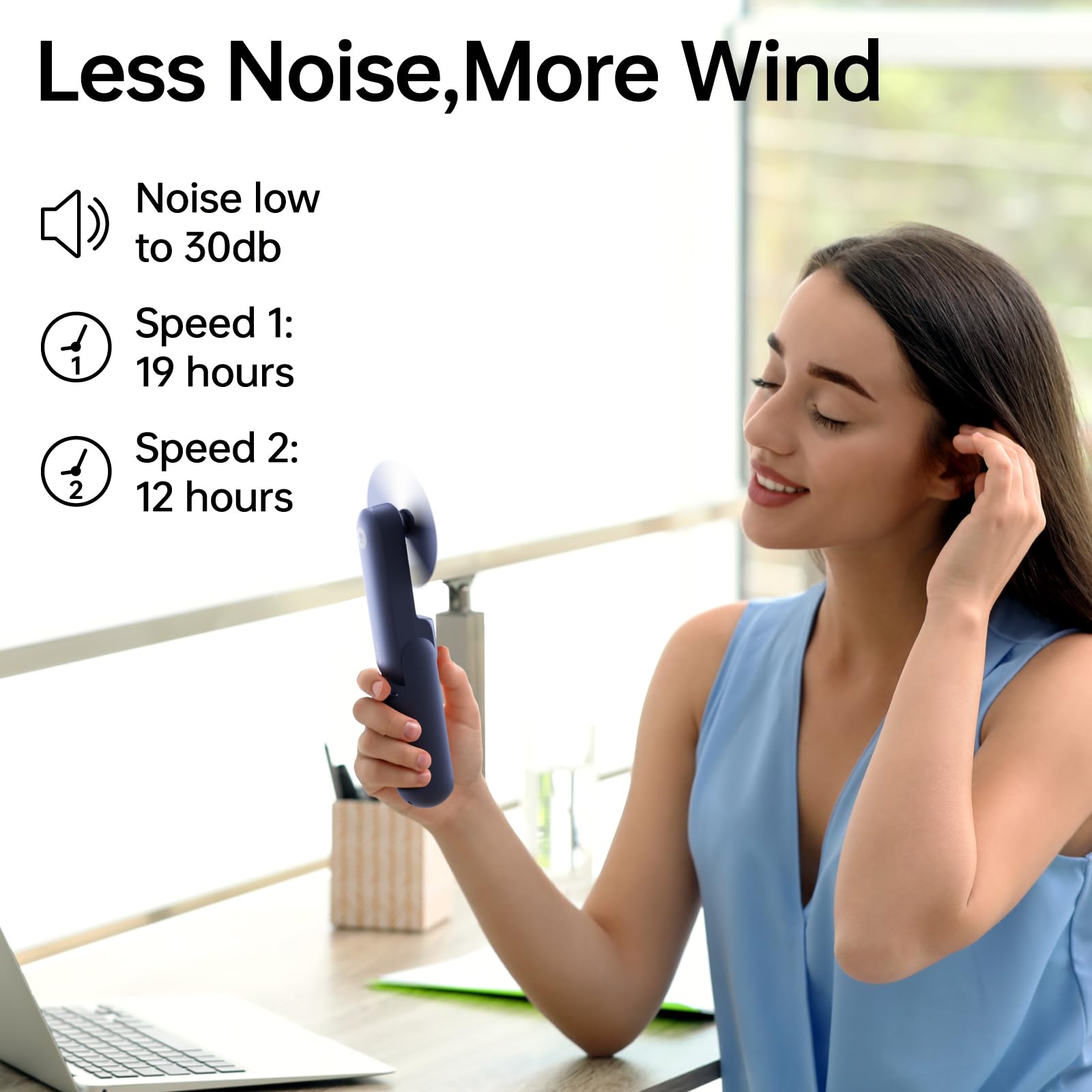 JISULIFE ventilador en mano generando brisa para comodidad inmediata