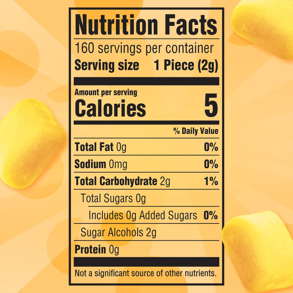 Juicy Fruit bottle held in hand demonstrating compact, travel-friendly size
