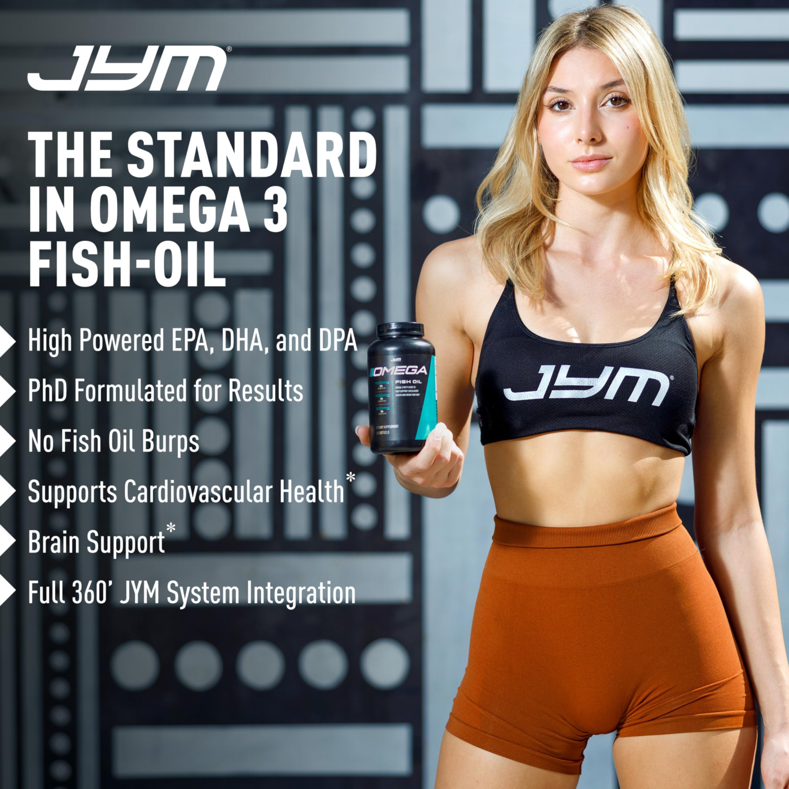 JYM Supplement Science cápsulas junto a un vaso de agua para toma con comidas