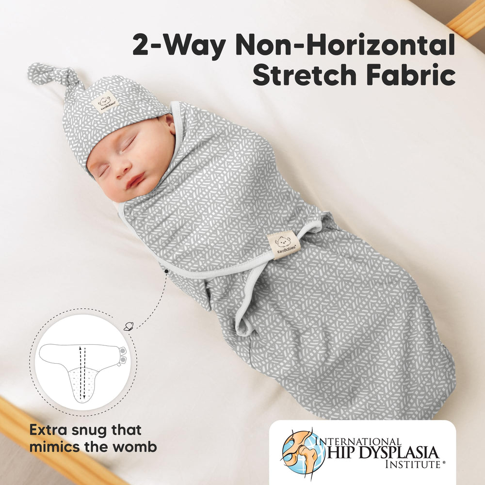 KeaBabies swaddle wrapped on newborn demonstrating ergonomic, snug fit