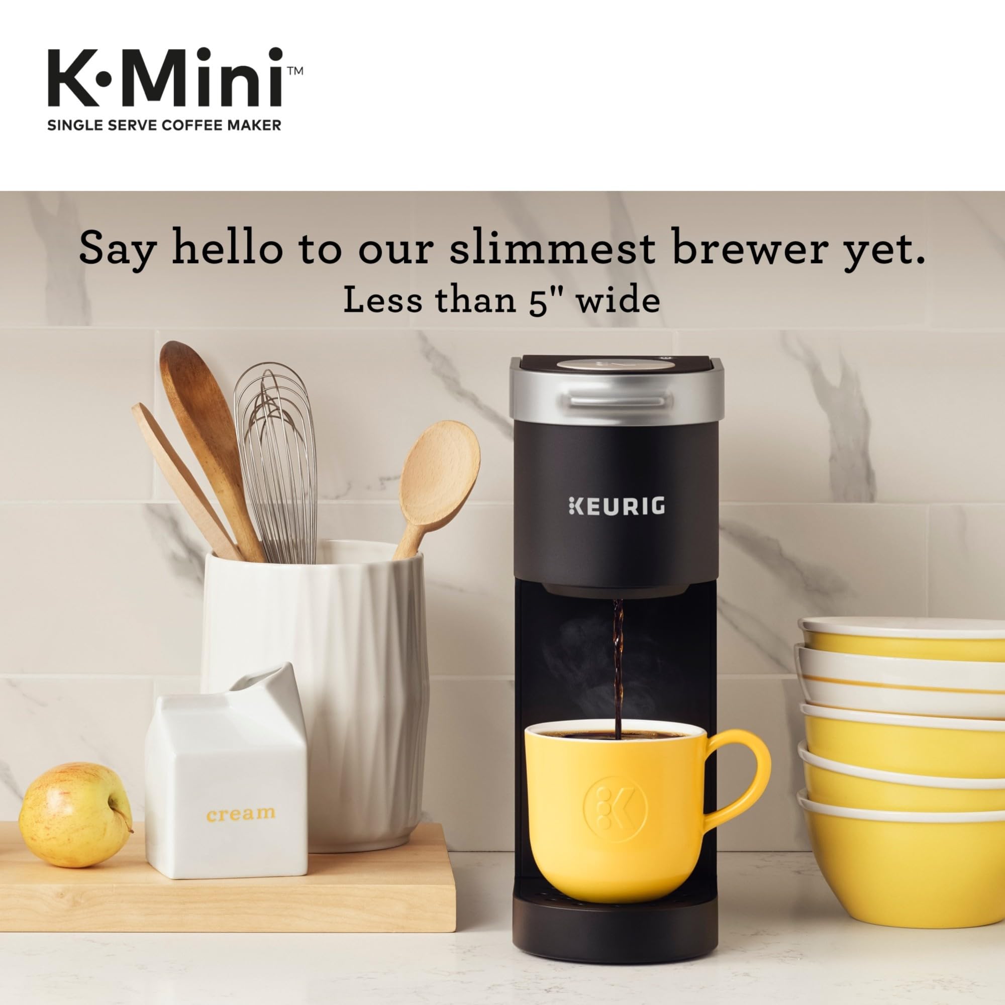 Keurig K-Mini bandeja extraíble mostrando limpieza y compatibilidad con tazas altas