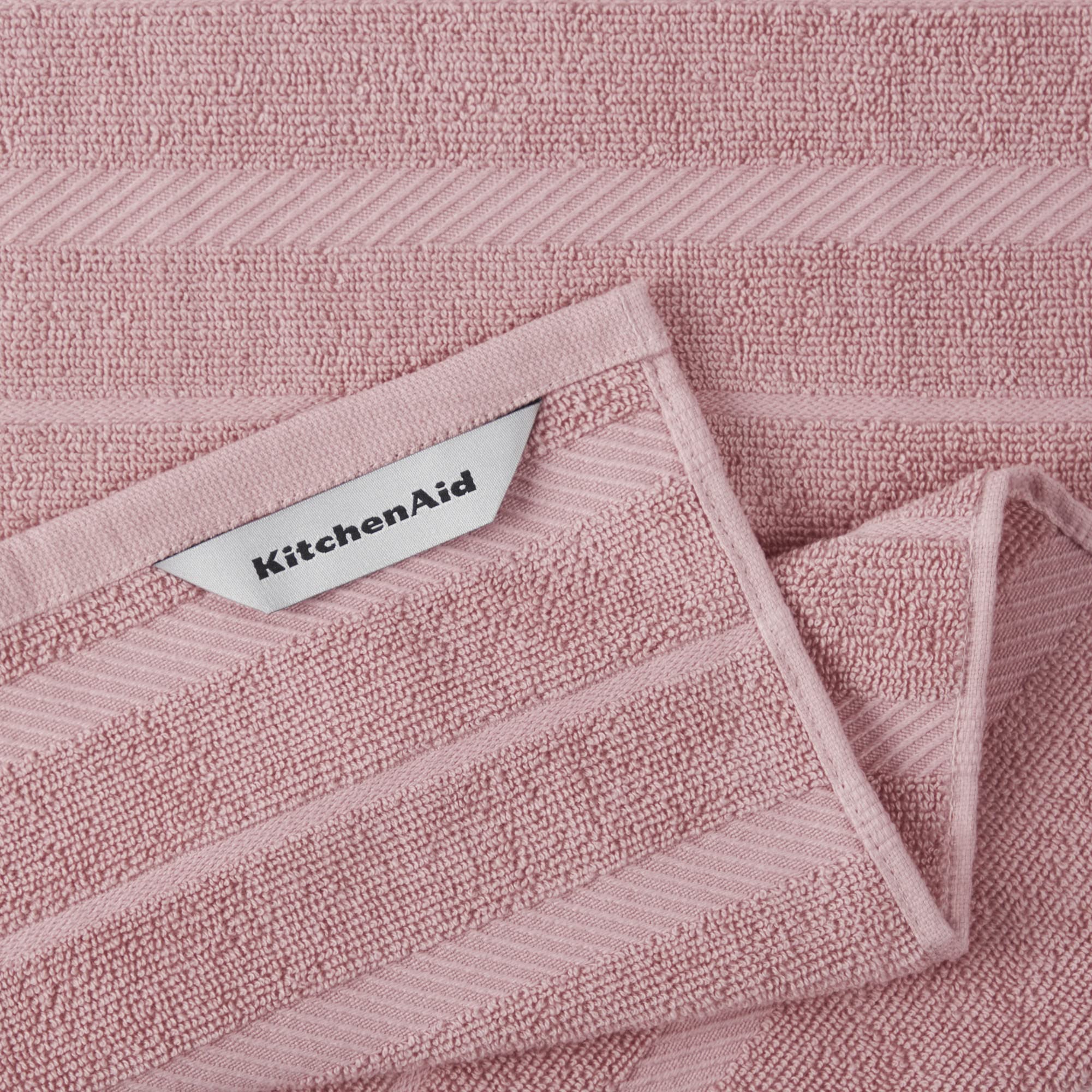 KitchenAid paño secando platos ilustrando absorción eficiente
