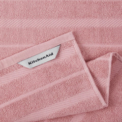 KitchenAid paño secando platos ilustrando absorción eficiente