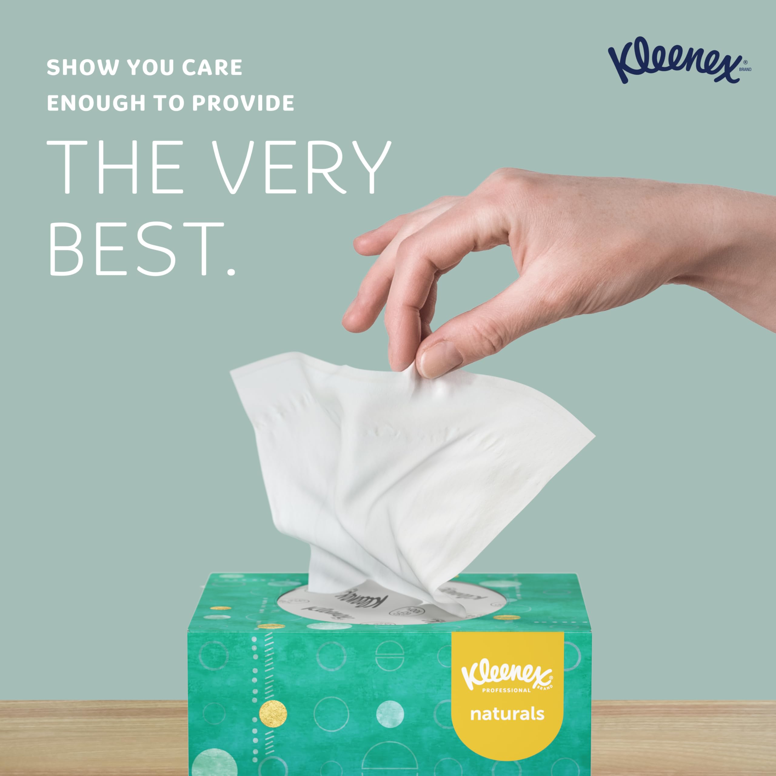 Kleenex caja abierta con pañuelo saliendo, fácil extracción y uso rápido