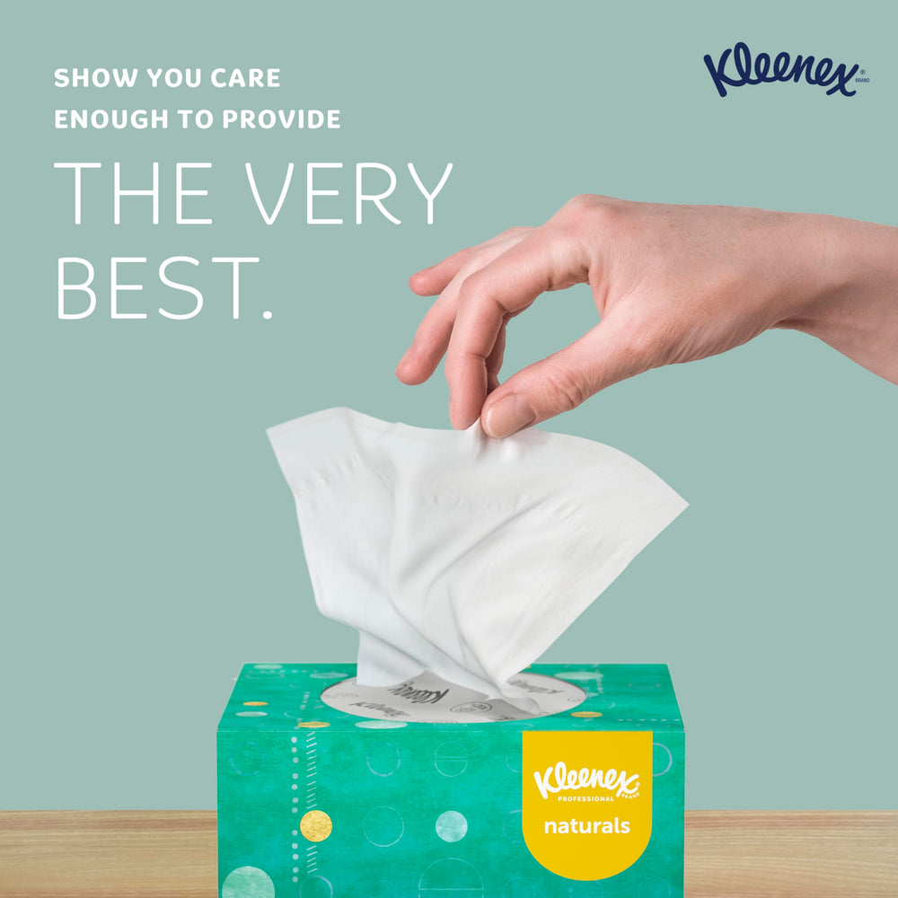 Kleenex caja abierta con pañuelo saliendo, fácil extracción y uso rápido