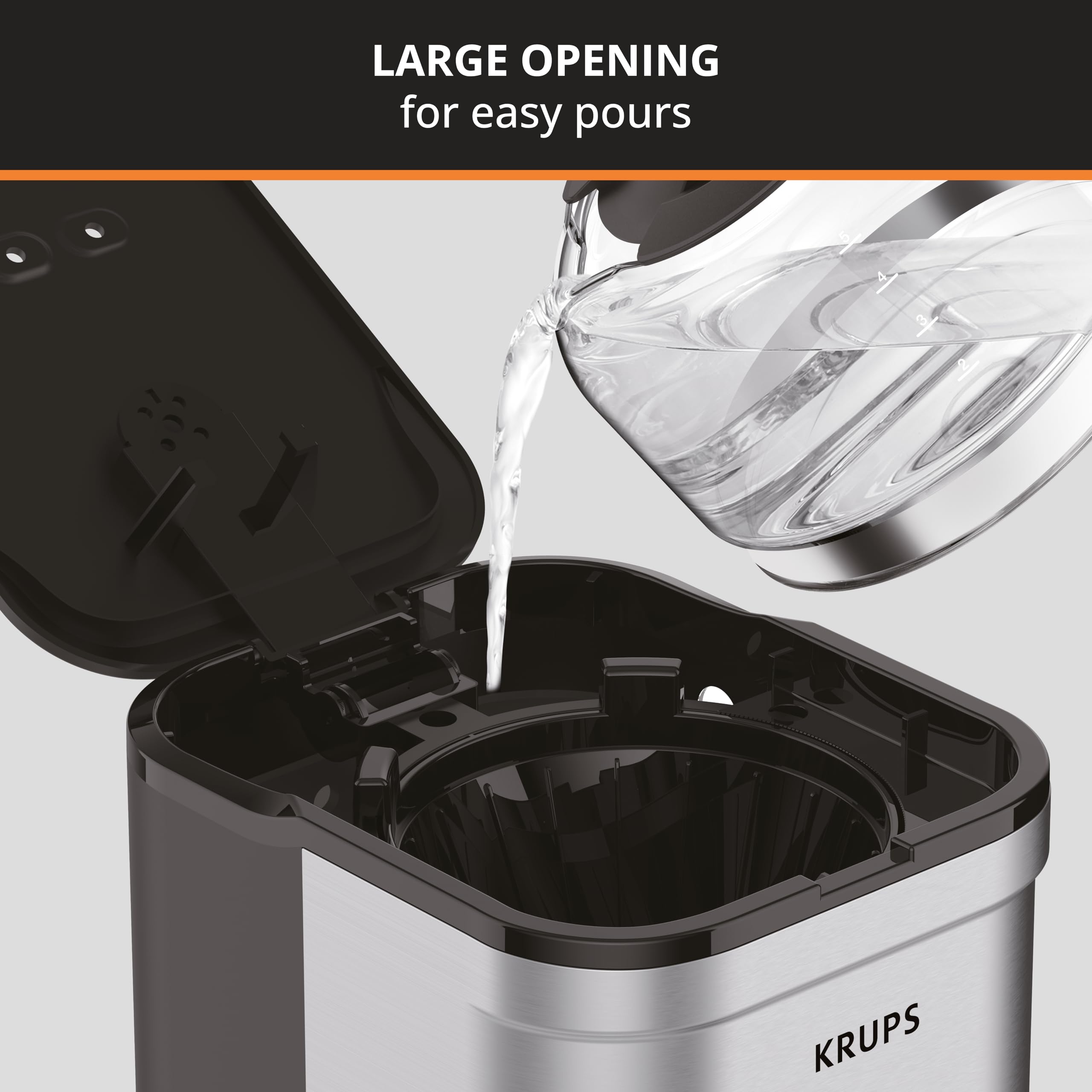 KRUPS cafetera en uso en cocina pequeña, ahorra espacio y prepara 5 tazas