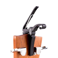 Kyser KG6BA parked on headstock illustrating handy storage and no-slip holding