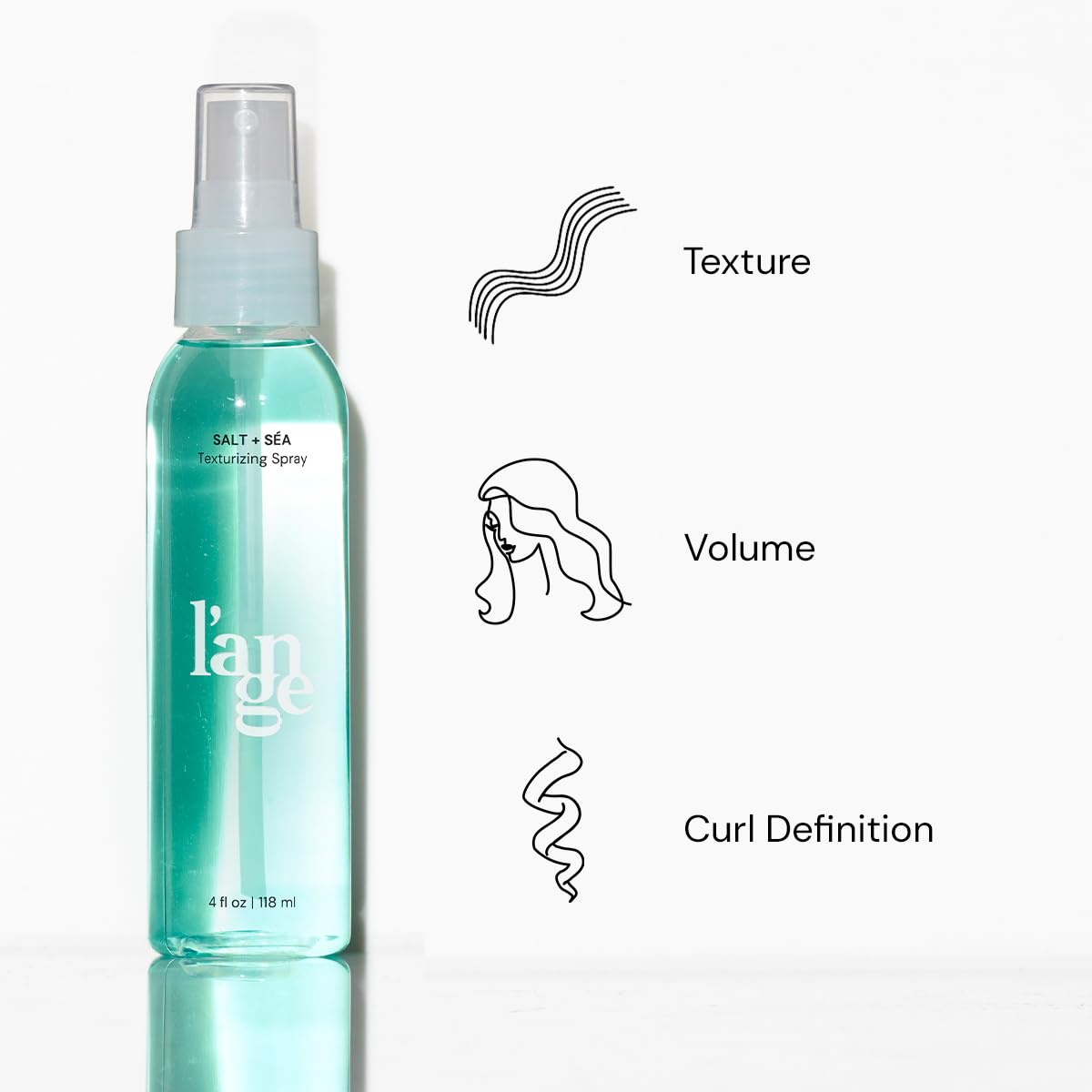 L'ANGE HAIR aplicando spray en cabello seco para volumen inmediato