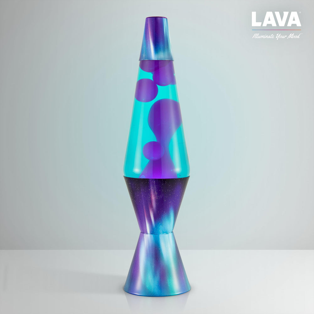 Lava Lite junto a libro para comparación de tamaño y escala práctica