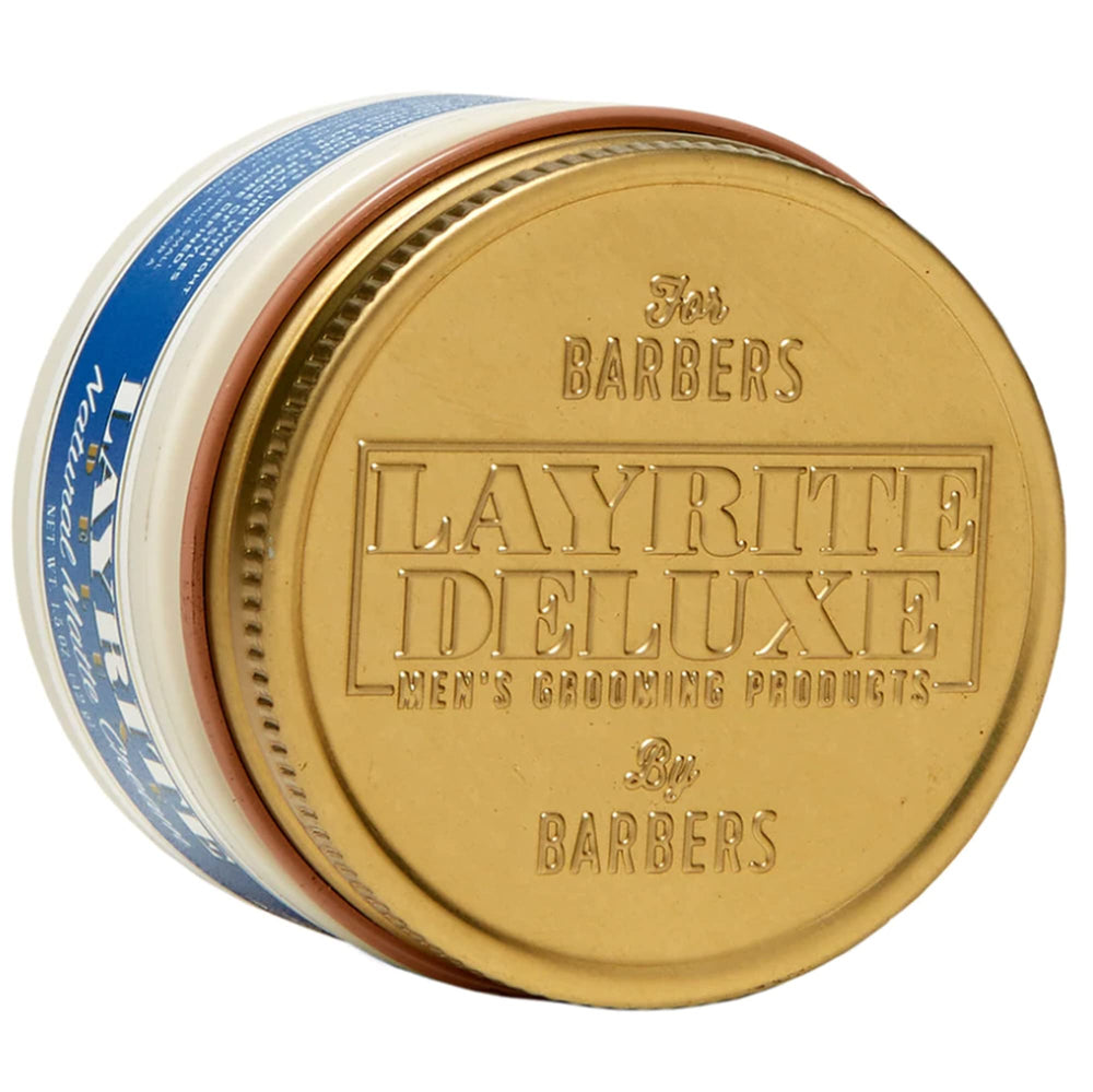 Layrite crema en manos aplicándose muestra cómo distribuir para control y volumen