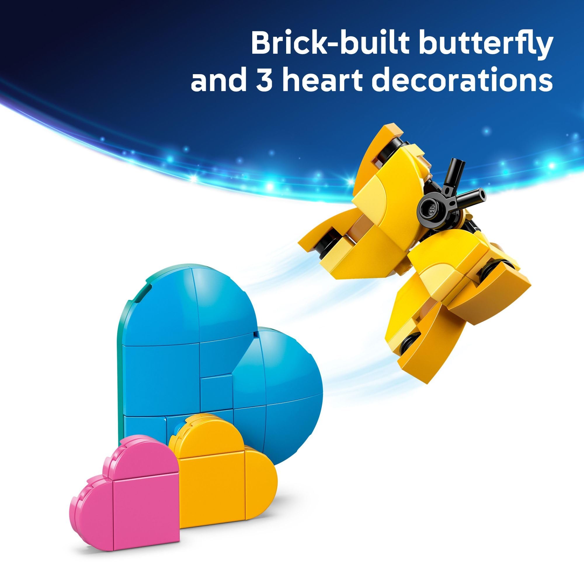 Comparación de escala: Angel de LEGO sobre manos mostrando sus 25 cm de altura